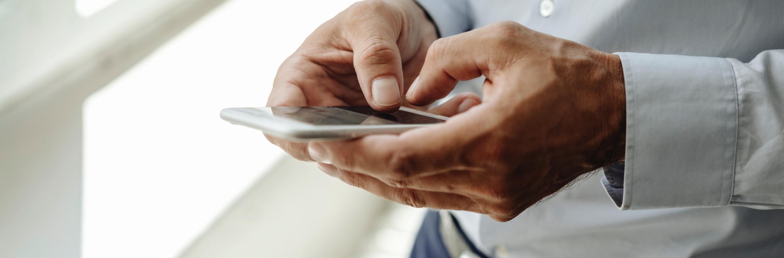 Close up of a cell phone being used