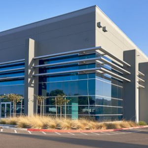 Glass and and grey industrial building facade